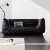 Black microfiber leather sofa in comfortable caterpillar style, measuring 70.87 inches long main product image